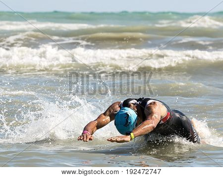 Pescara Italy - June 18 2017: athlete at swimming test of the Ironman 70.3 Pescara of June 18 2017