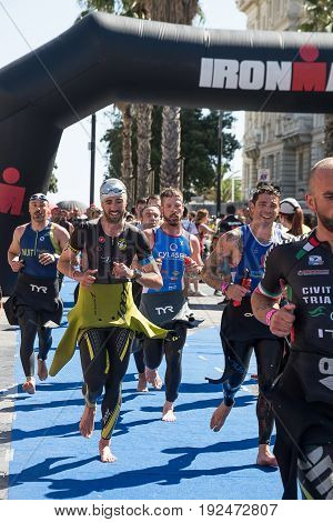 Pescara Italy - June 18 2017: Athletes in the transition area between swimming and bike at Pescara's Ironman 70.3