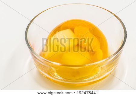 fruit jelly in a crystal bowl on white background