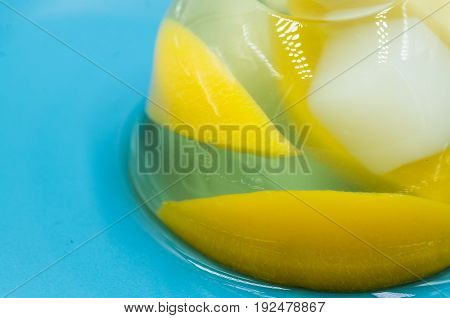 fruit various jelly mix on a blue plate