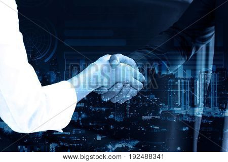 double exposure Business people shaking hands after closing deal in office partnership merger and acquisition concept