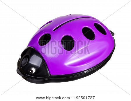Plastic violet ladybug toy. Brush for cleaning furniture from animal hair isolated on white background