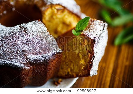 Sweet big honey cake on a white plate