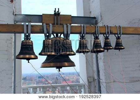 Different bells in church belltower in Kozelets town
