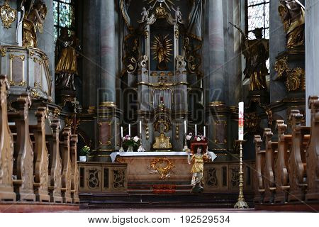 MAINZ, GERMANY - JUNE 08: The pompous altar of the St. Stephan church with gold-decorated sacred art on June 08, 2017 in Mainz.