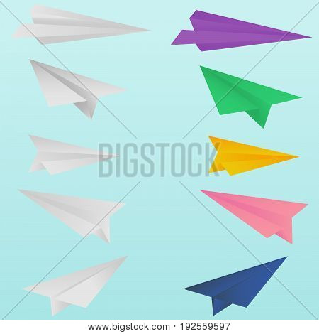 A set of paper planes, white and colored
