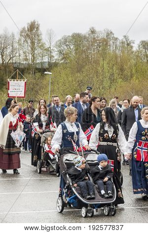 VERDAL NORWAY - MAY 17 2017: National day in Norway. Norwegians at traditional celebration and parade on may 17 2017 in Verdal. People on parde before school in Verdal. Constitution Day is the National Day of Norway.