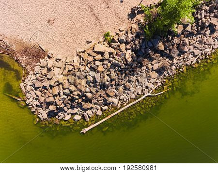 Aerial view of ocean beach. Sand beach and sea view from above. Beach aerial view of ocean water and sand shore. Aerial shot of beach