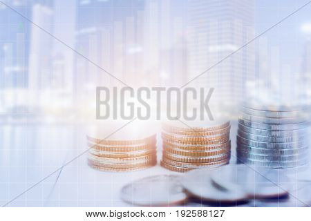 Double exposure of coin pile is a city black. Concept for business financial planning.