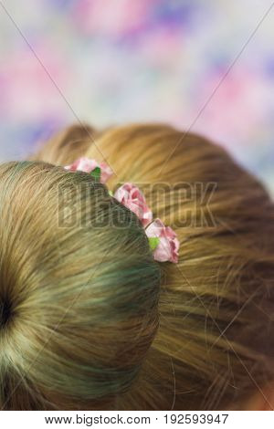 Girl With Topknot On Nape