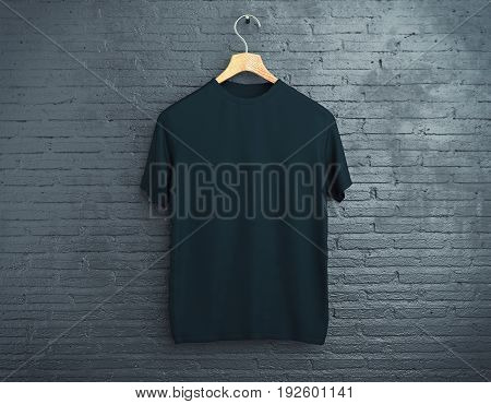 Wooden hanger with empty black t-shirt hanging on dark brick background. Retail concept. Mock up. 3D Rendering