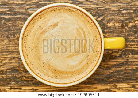 Top view of coffee drink. Latte foam texture.