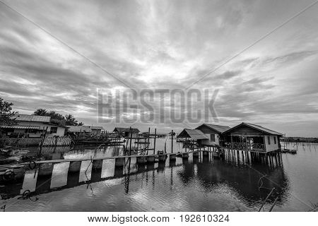Homestay and floating basket in lake at Kohyo Songkhla Thailand with beautiful sky and clouds. This is traditional fisheries area.
