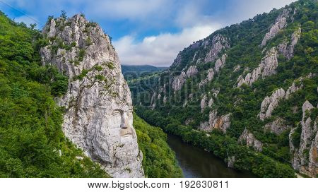 Decebal Head sculpted in rock. Danube Gorges (Cazanele Dunarii) Romania.