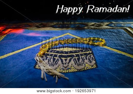 Holy Quran With Beads On A Prayer Mat, Muslim Tasbih Is A String Of Prayer Beads Which Is Traditiona