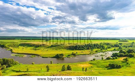 A landscape of hills by the river, top view
