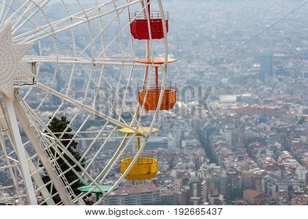 Aerial view on Barcelona town from Ferris wheel at mount Tibidabo, Spain