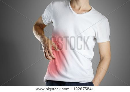 Guy In White Shirt Scratching His Body. Scabies. Scratch The Body. Isolated