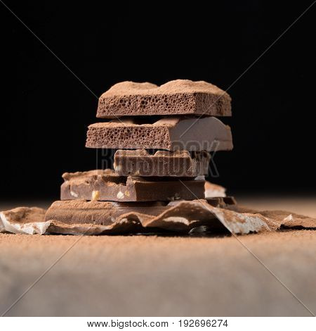 Milk chocolate on empty background
