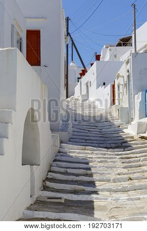 Street with typical Cycladic architecture in Apollonia village on Sifnos island in Greece.