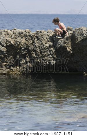 Girl Climbed On Some Rocks