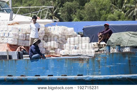 PHU QUOC, VIETNAM - March 21, 2017: Lifestyle of fishermen on their boats in An Thoi pier village, Phu Quoc island, Vietnam