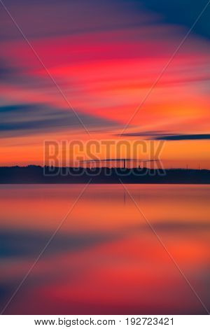 Orange And Red Sunset At Coast Of The Lake
