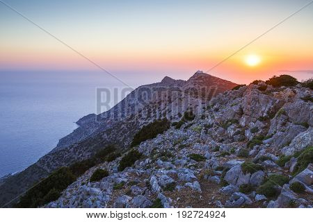 Sunset over mountains near Kamares village on Sifnos island, Greece.