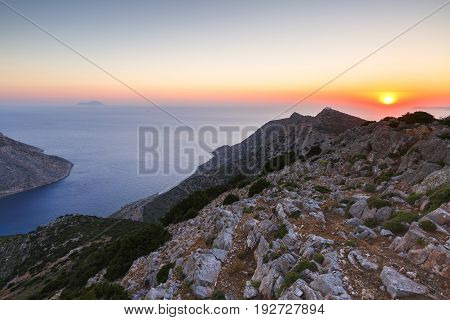 Sunset over mountains near Kamares village on Sifnos island, Greece.