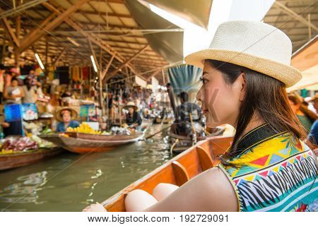 Asian Woman Looking At Vendors Pedlar