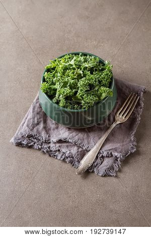 Fresh Green Italian Salad Kale. Dark Background.