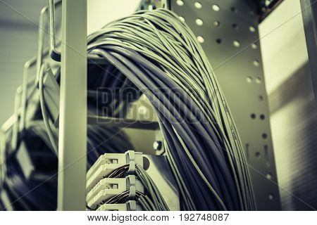 Network cables in data center room, toned