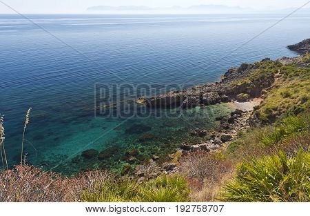 A small pebble beach Lo Zingaro Nature Reserve in Sicily Italy