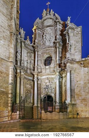 Valencia Cathedral or Basilica of the Assumption of Our Lady of Valencia Spain. The Iron Gate in evening