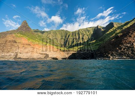 Ka'a'Alahina Ridge on Na Pali coastline in Kauai from sunset cruise