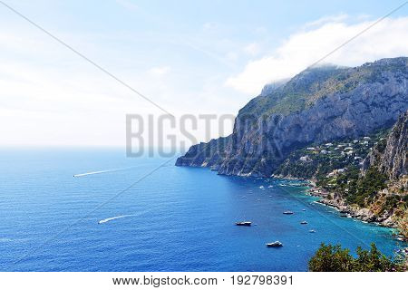 big mountains and sea under blue sky