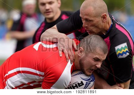 ST. PETERSBURG, RUSSIA - MAY 27, 2017: Match Busly, Belarus (red and white shirts) vs Livonia, Latvia during Rugby Europe Sevens Club Champion's Trophy