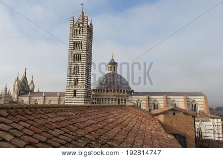 Italy Siena - December 26 2016: the view from facciatone of Duomo di Siena or Metropolitan Cathedral of Santa Maria Assunta on December 26 2016 in Siena Tuscany Italy.