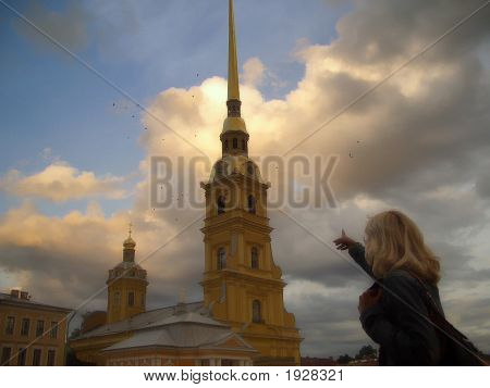 Young Girl Showing On Flying Ravens