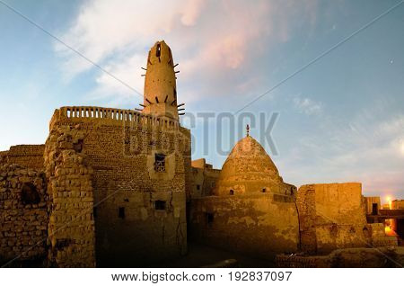 Exterior view to Al-Qasr old town and mosque in Dakhla oasis Egypt