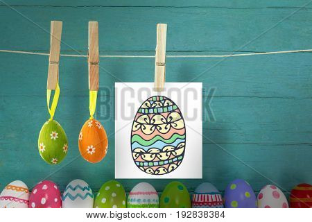 PE047_eggs_02_bs_nf against various easter eggs arranged on wooden surface