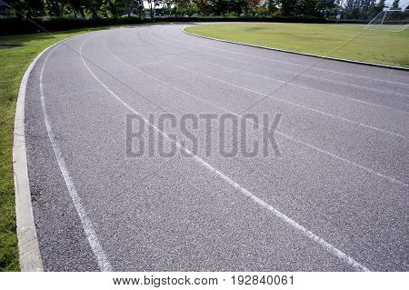 Gray treadmill at the stadium with the numbering from one to seven