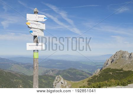 Poland Tatra mountains Signpost at Kondracka Przełęcz overcast sky