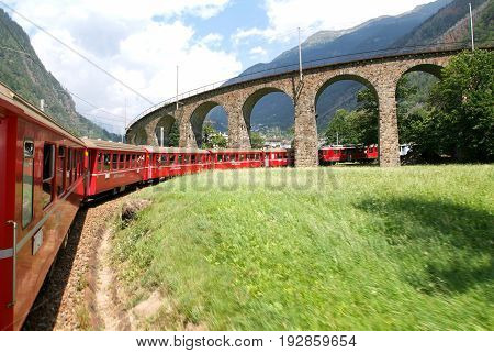 Bernina Express Train At Brusio On The Swiss Alps