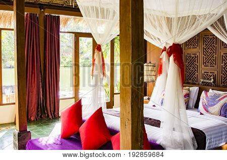 Bali Interior of luxury tropical bedroom Indonesia
