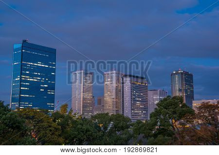 OsakaJapan - November 28 2015 : Japan cityscape at Osaka in autumn looking from Osaka castle in Osaka Japan.