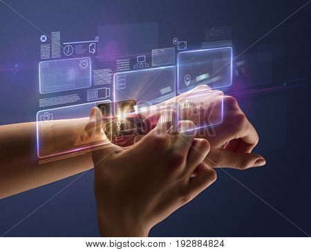 Female hand wearing smartwatch with statement labels around and dark background