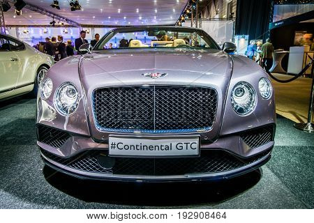 MAASTRICHT NETHERLANDS - JANUARY 14 2016: Luxury car Bentley Continental GTC V8S since 2016. International Exhibition InterClassics & Topmobiel 2016