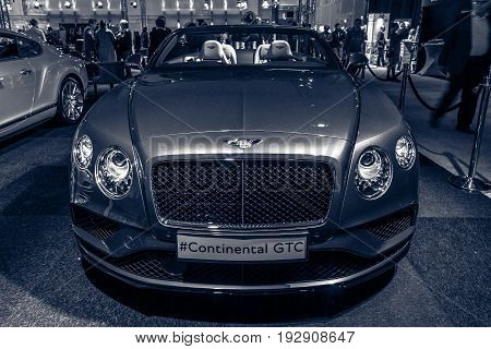MAASTRICHT NETHERLANDS - JANUARY 14 2016: Luxury car Bentley Continental GTC V8S since 2016. Toning. International Exhibition InterClassics & Topmobiel 2016