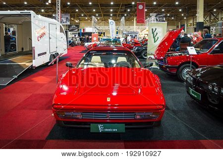 MAASTRICHT NETHERLANDS - JANUARY 14 2016: Sports car Ferrari 328 GTS 1987. International Exhibition InterClassics & Topmobiel 2016
